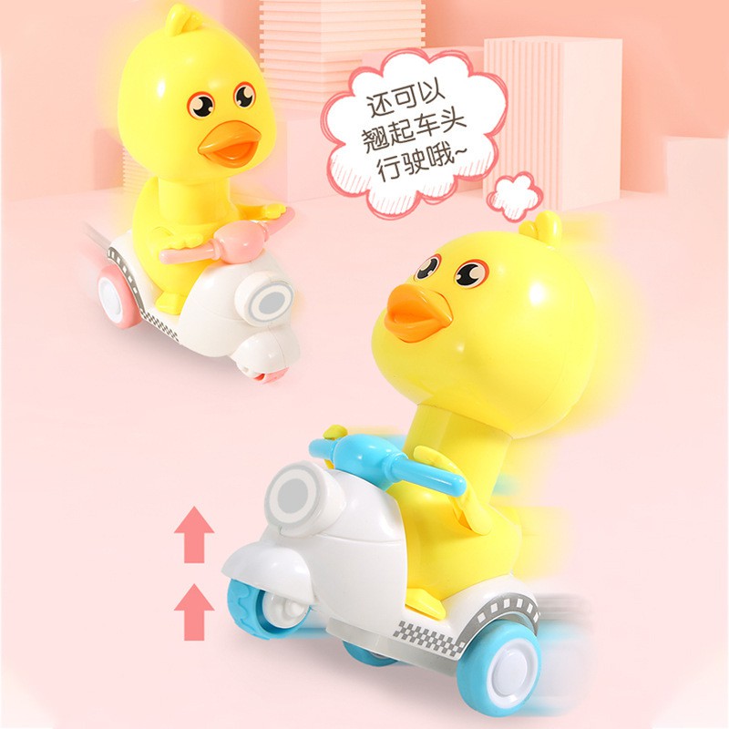 [Miễn phí vận chuyển] nhấn con vịt nhỏ màu vàng kéo lại xe hoạt hình quán tính xe máy trẻ em bé trai và bé gái đồ chơi rung cùng một đoạn