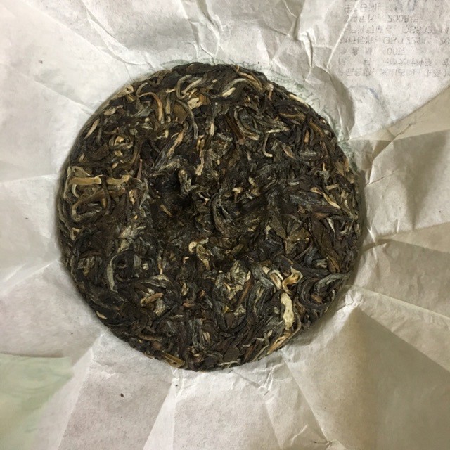 Trà Phổ Nhĩ sống Vân Nam bánh 100g | BigBuy360 - bigbuy360.vn