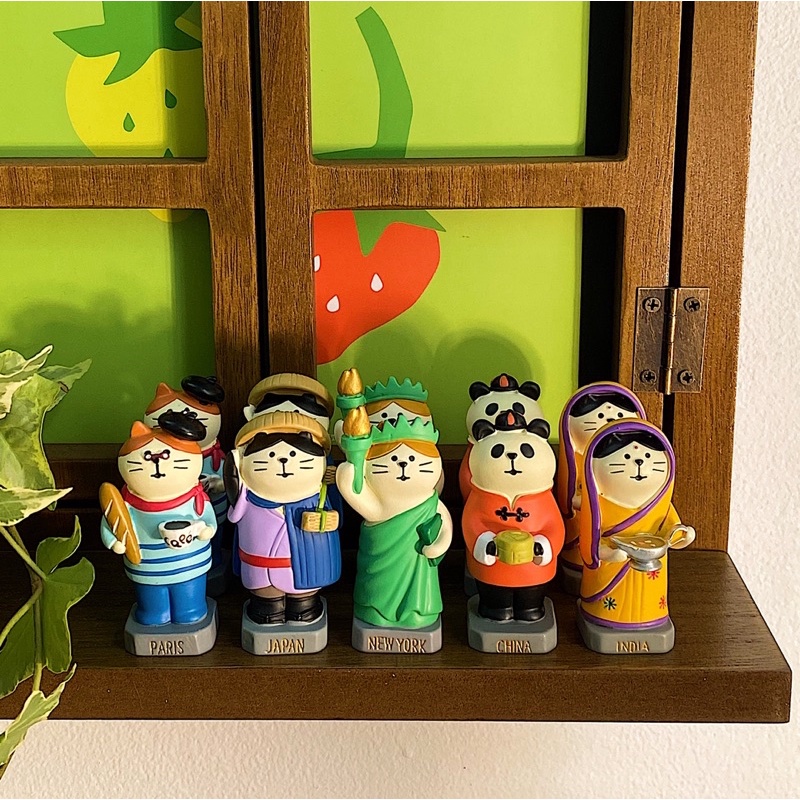 Mô hình mèo chủ đề du lịch