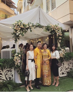Váy tầng nơ eo