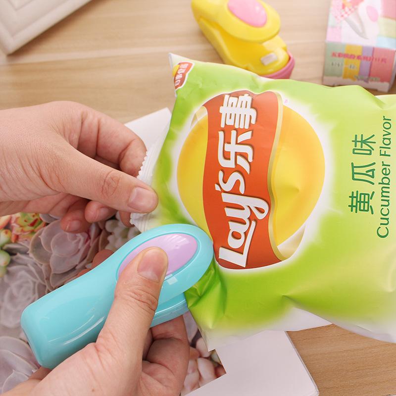 Kẹp bấm hàn cầm tay nhỏ đóng kín miệng túi nhựa thực phẩm / đồ ăn nhẹ bằng nhiệt sử dụng tại nhà