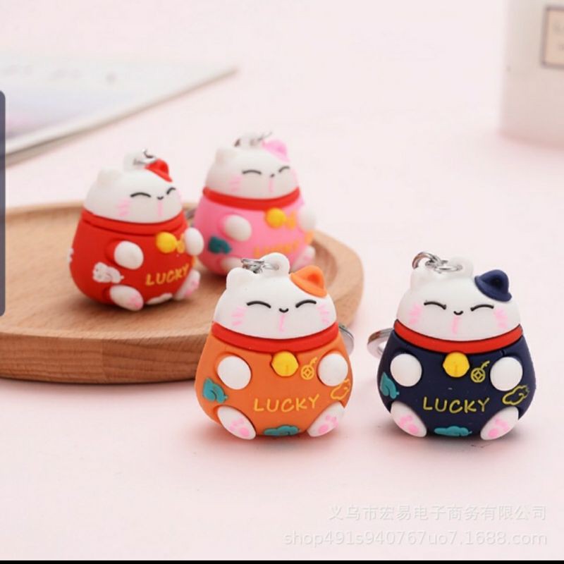 Móc khóa Mèo Thần Tài May Mắn Khủng Long Heo Hồng Mặc áo Cute