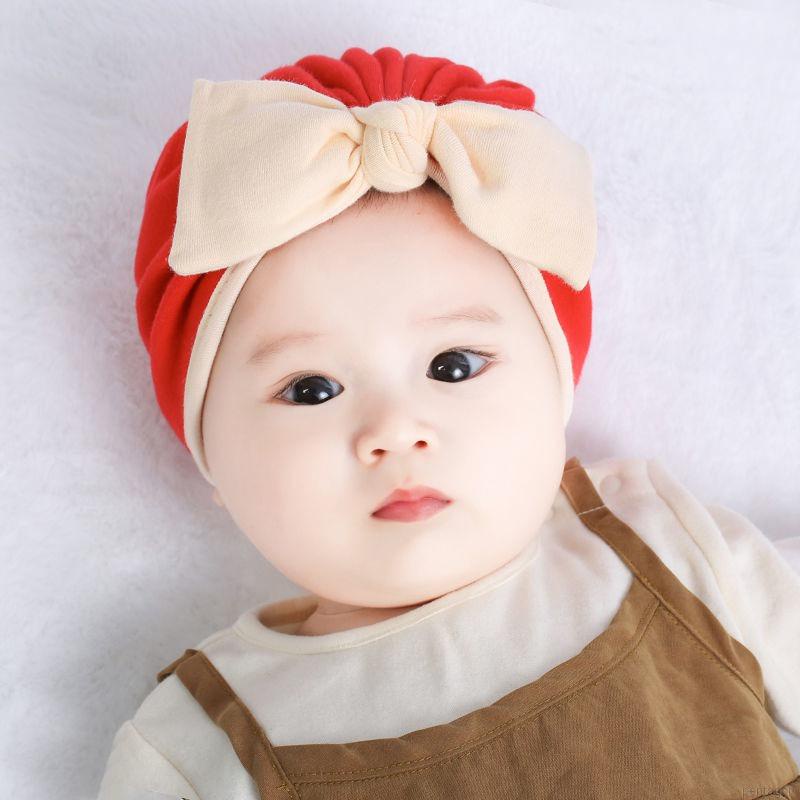 Mũ trùm đầu beanie đính nơ màu trơn đáng yêu dành cho trẻ em