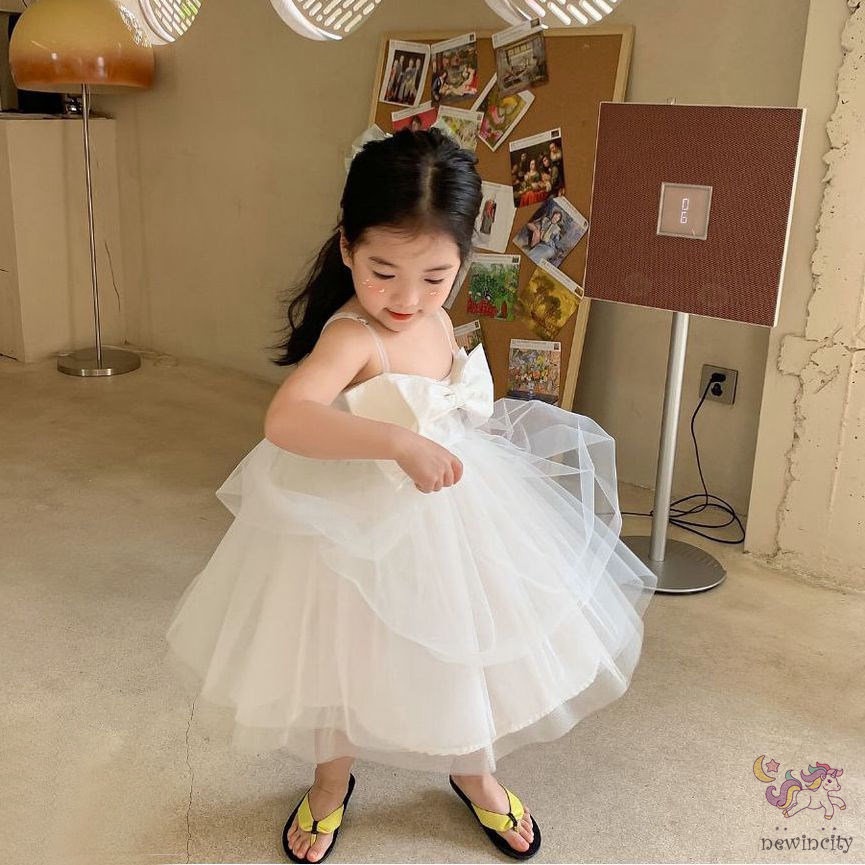 Đầm công chúa hai dây đính nơ kiểu Hàn Quốc xinh xắn dành cho bé gái