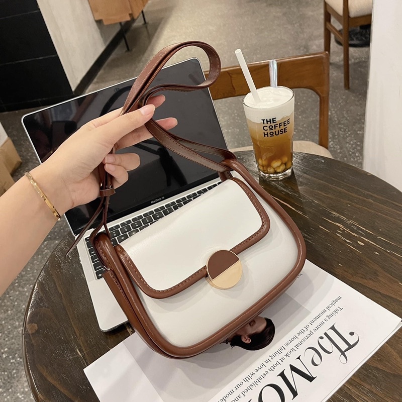 TÚI ĐEO VINTAGER VIỀN NÂU KHOÁ TRÒN