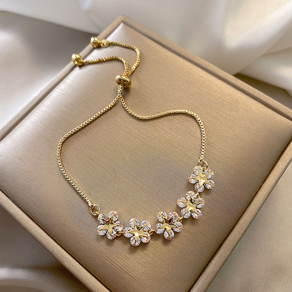 Vòng Đeo Tay Hình Ngôi Sao Và Hoa