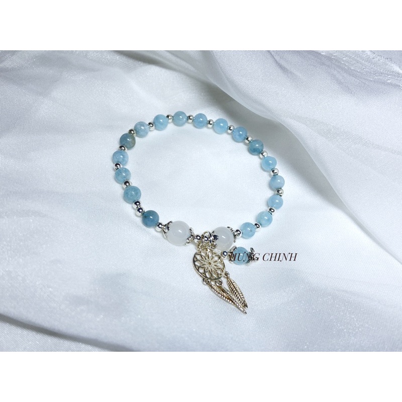 Vòng aqua mix charm
