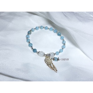 Vòng aqua mix charm