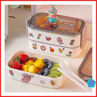 Hộp cơm 2 tầng giữ nhiệt có kèm đũa thì bằng chất liệu nhựa có lỗ thoát hơi