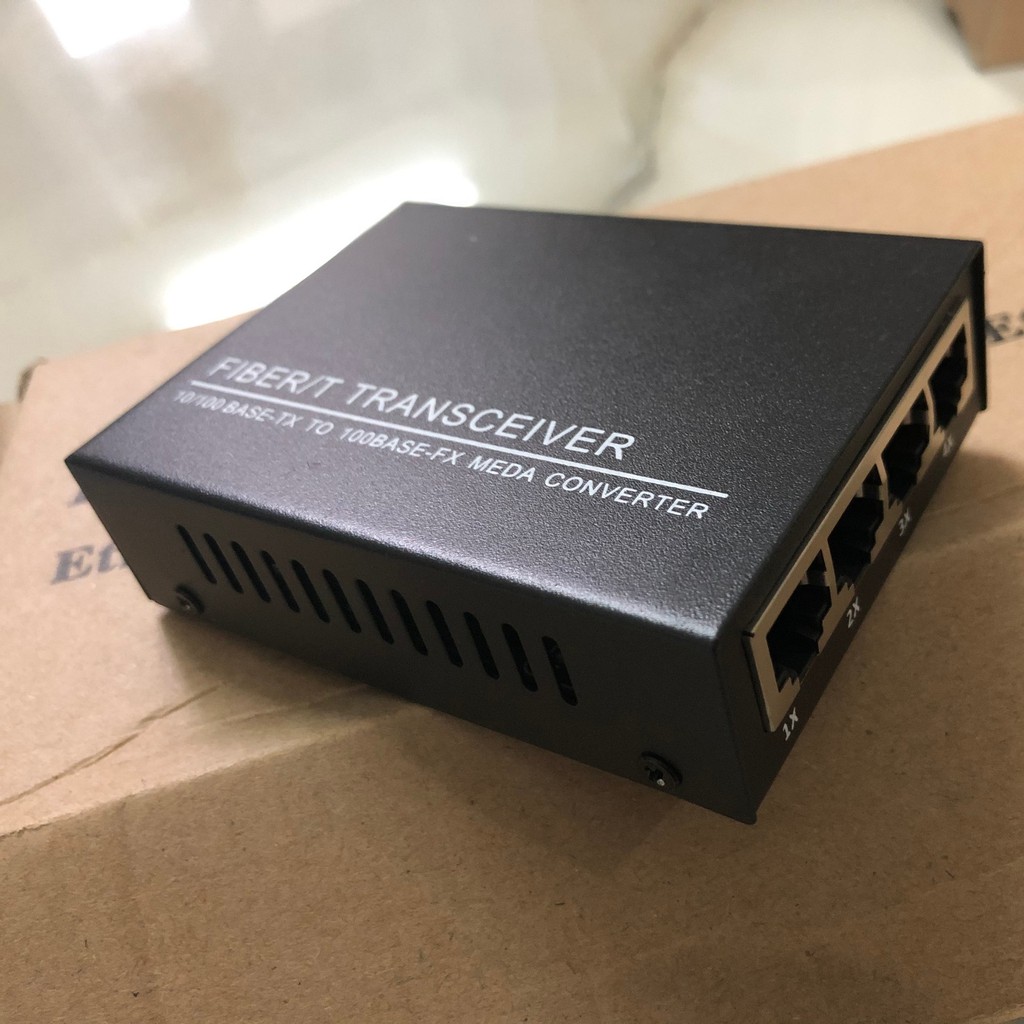 Bộ chuyển đổi quang điện Netlink 1 quang 4 LAN - Converter quang 100Mbps