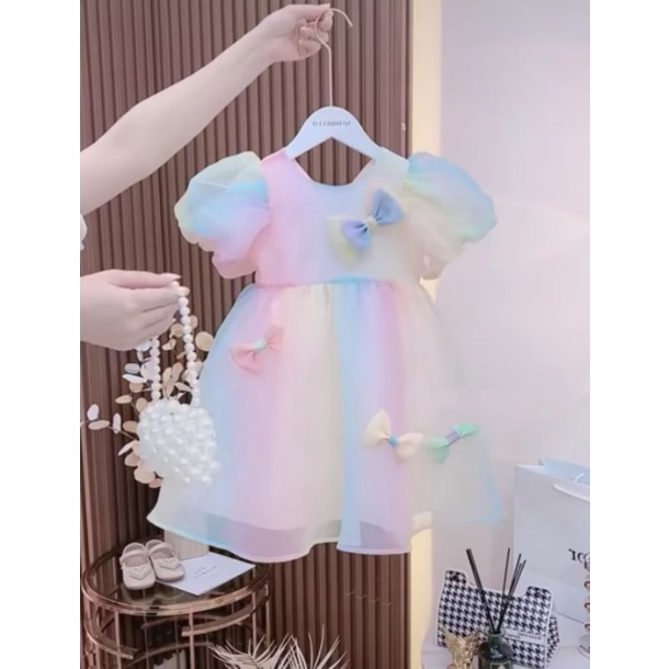 Váy nơ nhỏ cầu vồng cho bé giá cả yêu thương -A49