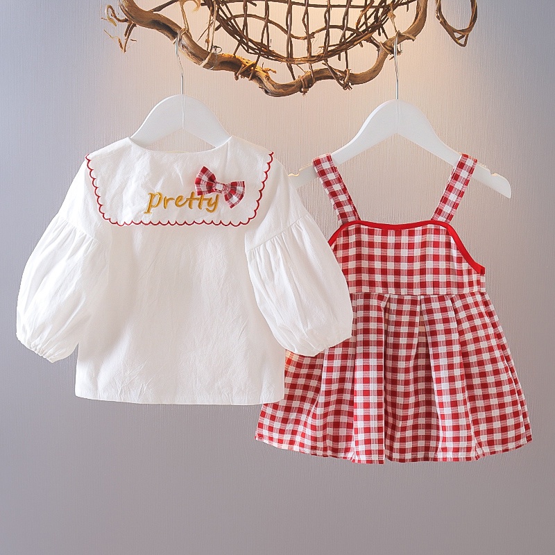 Set đồ hai món gồm áo sơ mi dài tay thêu họa tiết và chân váy caro thời trang cho bé
