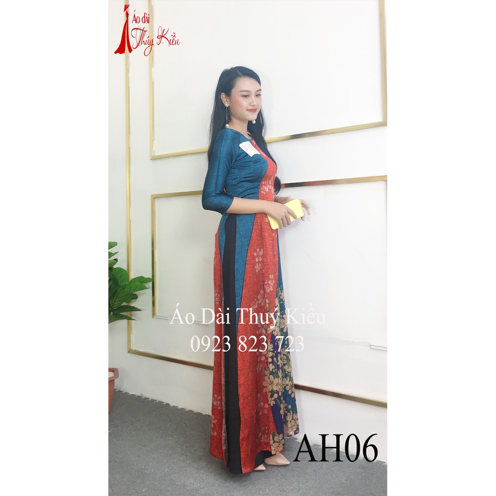 Áo dài Đông Hưng nền xanh đỏ gân chìm in hoa hồng AH06