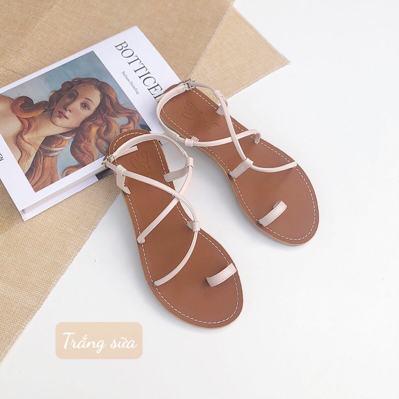 Sandal mũi tròn xỏ ngón quai chéo lệch , xinh chân dã man ý