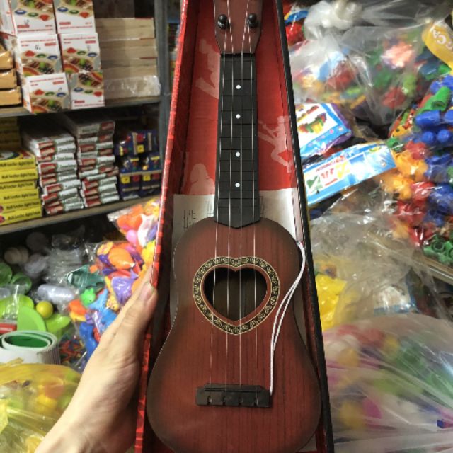 Đàn ghita nhựa giả gỗ