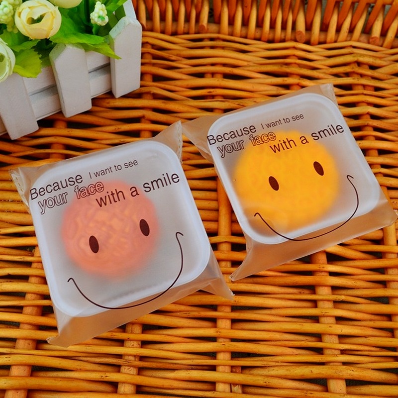 Set 100 Túi Đựng Bánh Kẹo Tự Dính Hình Mặt Cười Trong Suốt