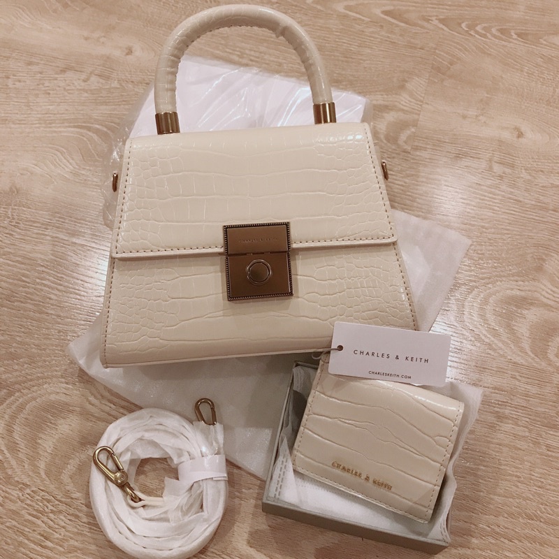 Túi quai xách đeo chéo Cnk tag vàng đồng