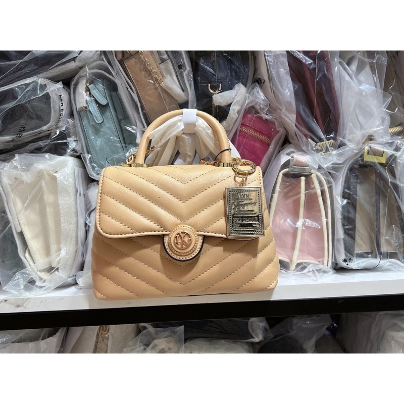 Túi lyn coco tay cầm