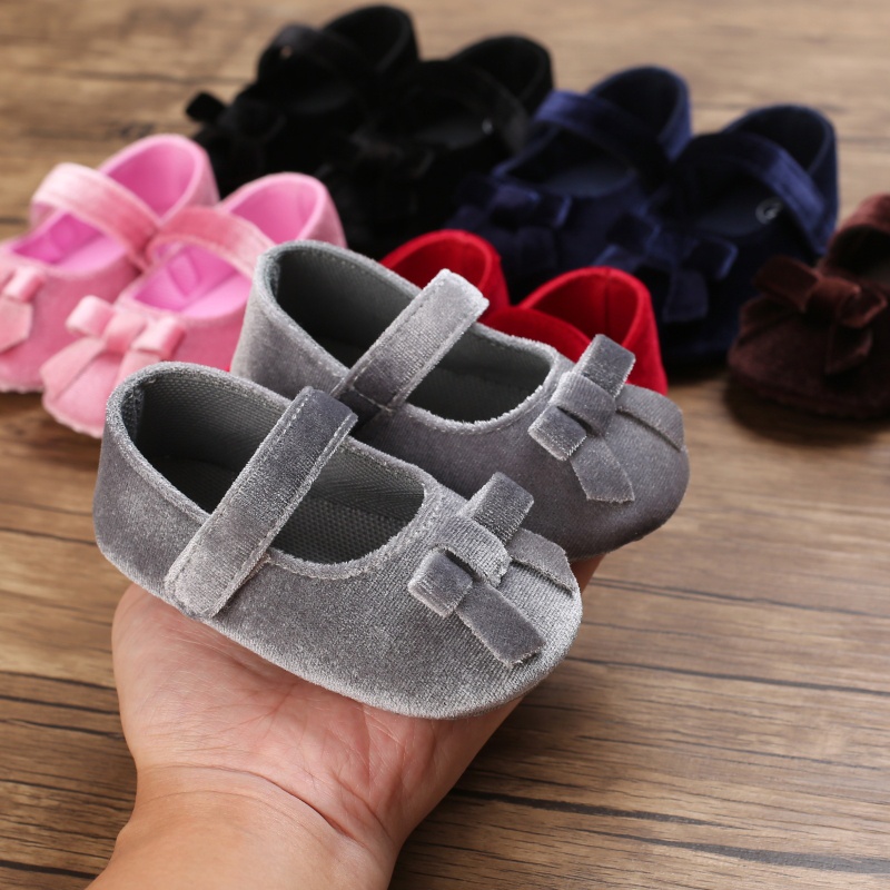 Giày nhung thắt nơ kiểu dáng công chúa dùng cho trẻ nhỏ