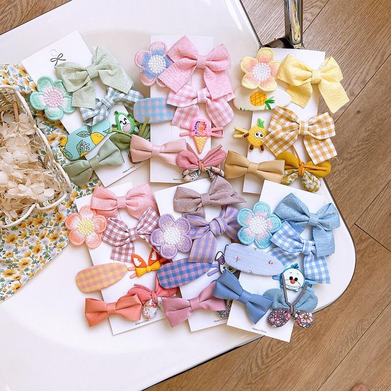 Kẹp tóc hình nơ màu kẹo ngọt ngào đáng yêu cho bé