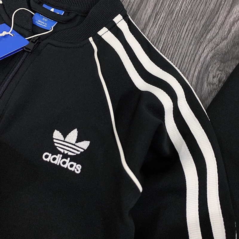 Bộ Thể Thao Das Đen Khoá Kéo In Logo Cho Bé