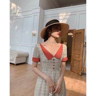 Đầm caro nút bọc