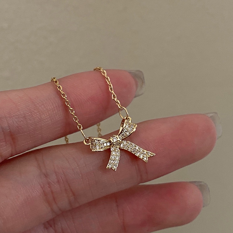 Vòng cổ vàng mặt nơ đính đá pha lê 3d lấp lánh phong cách vintage cho nữ