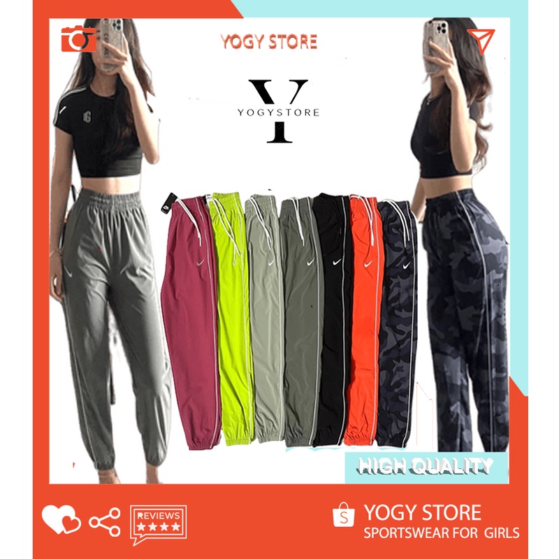Quần dài jogger thể thao nữ NK sọc trắng hai bên, chất vải thun xi dù mềm, co dãn tốt, form rộng