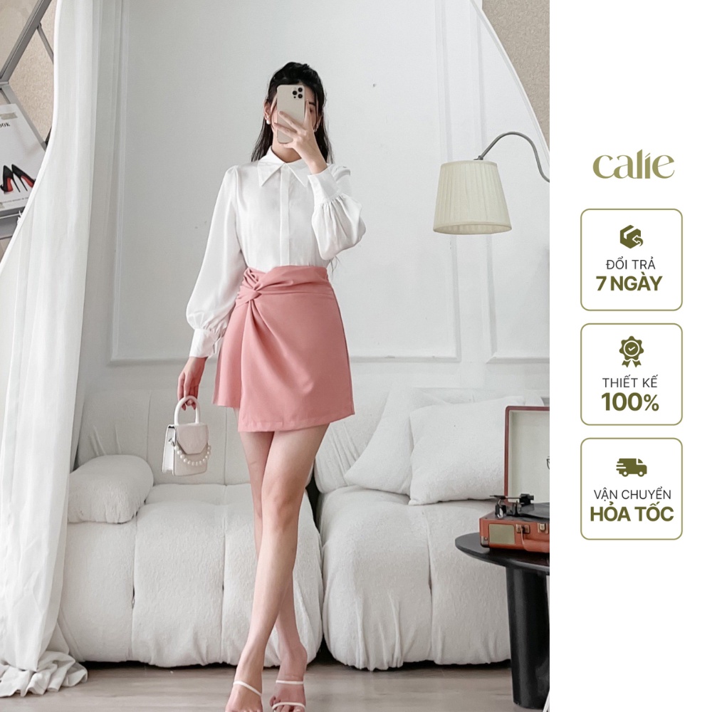 Chân váy ngắn xoắn tà lệch trẻ trung công sở Calie CA027
