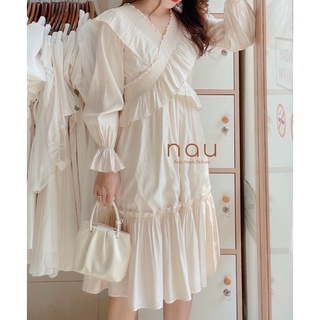 Đầm kem chéo bo eo suông rộng