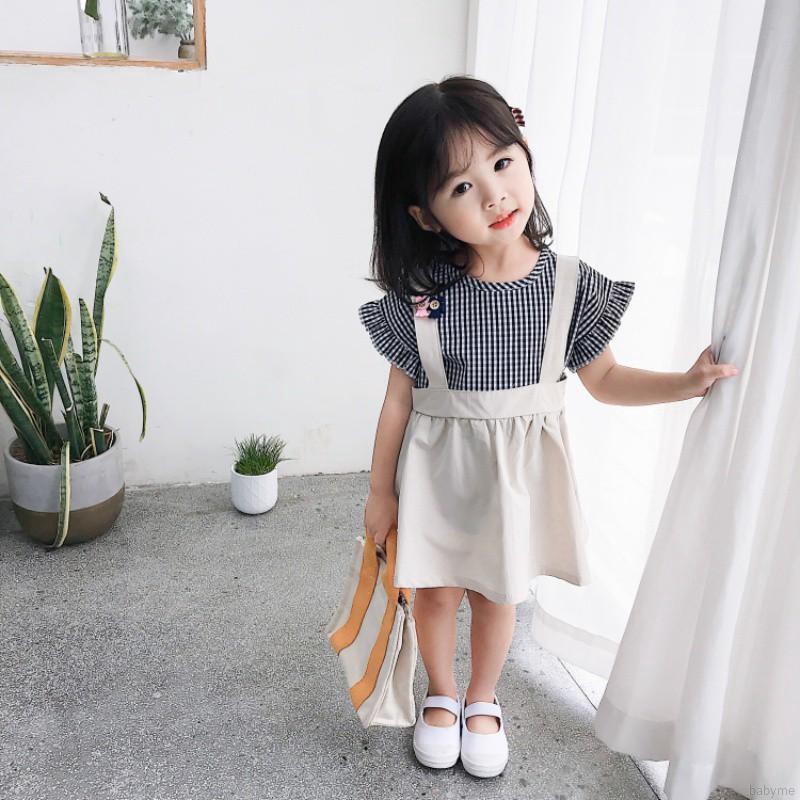 Set áo sơ mi ngắn tay + chân váy caro đính nơ dễ thương cho bé gái