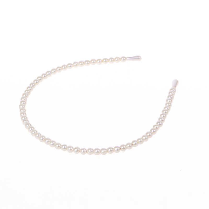 Thun cột tóc gắn ngọc trai sáng tạo