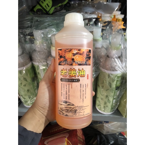 Tinh dầu massage thảo dược gừng nóng cao cấp