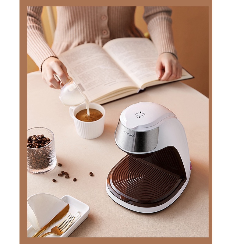 Máy pha cà phê KONKA kèm cốc sứ như hình, máy pha ra 1 cốc cà phê tầm 200ml, pha trà, trà hoa...