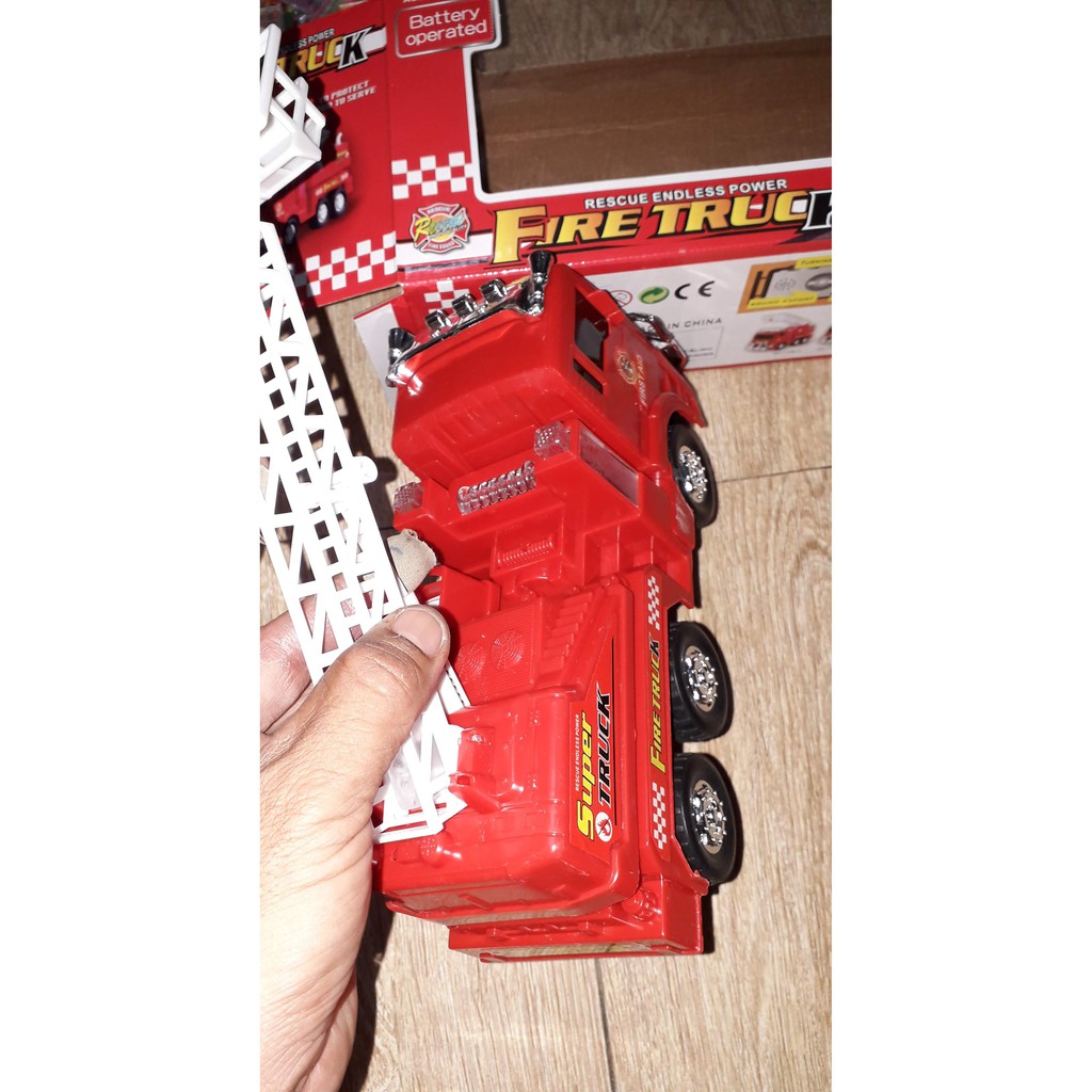 Xe mô hình xe thang cứu hộ bằng nhựa chạy pin có nhạc và đèn led rất đẹp-tặng kèm pin kích thước 20x18x8 cm