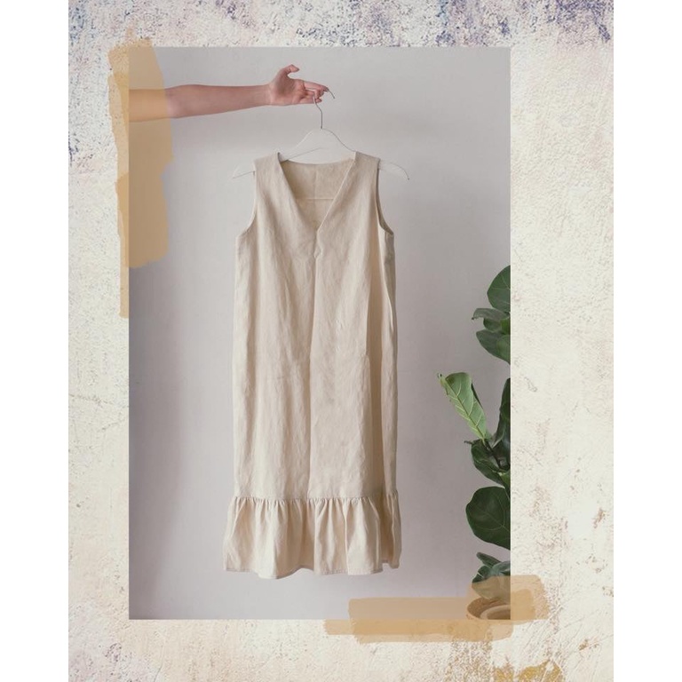 Đầm linen đuôi cá vải tưng muối tiêu