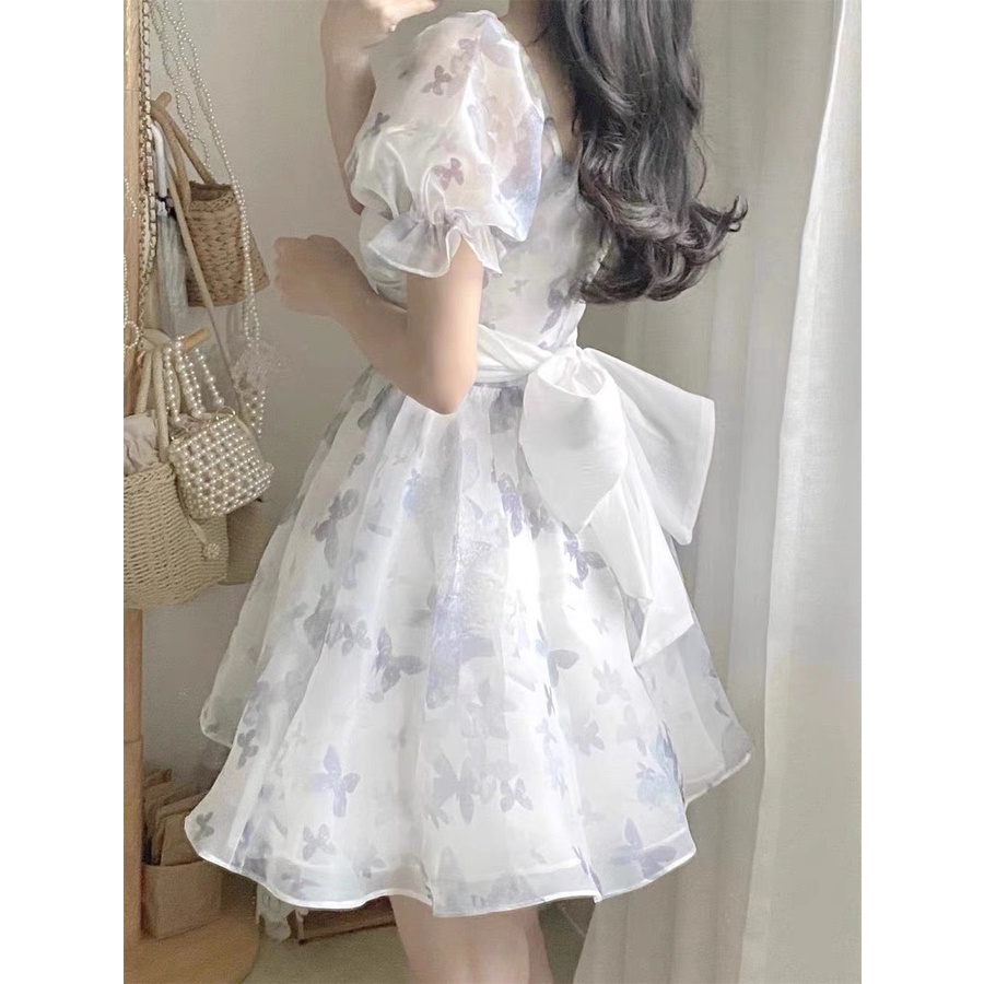 Đầm xinh đi tiệc, dạo phố hoa in nỗi thắt nơ sau