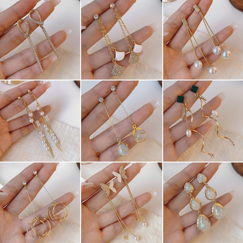 Khuyên tai tua rua dài đính ngọc trai