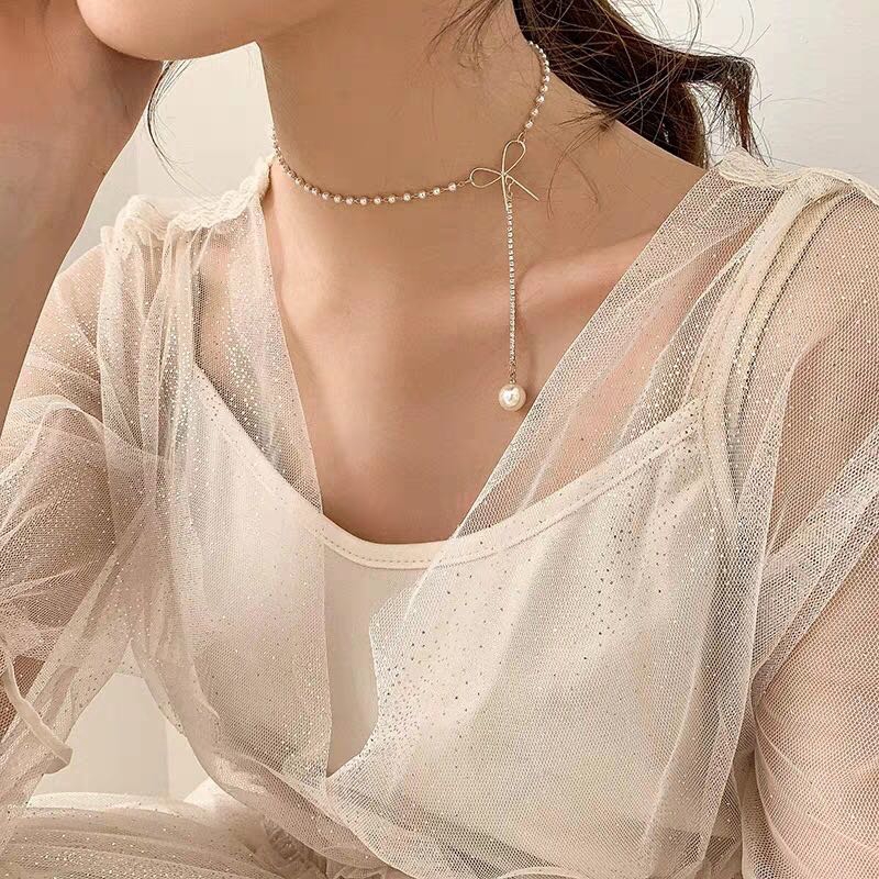 Vòng cổ dáng dài phối ngọc trai / nơ phong cách đối lập Hàn Quốc thời trang cổ điển quyến rũ cho nữ