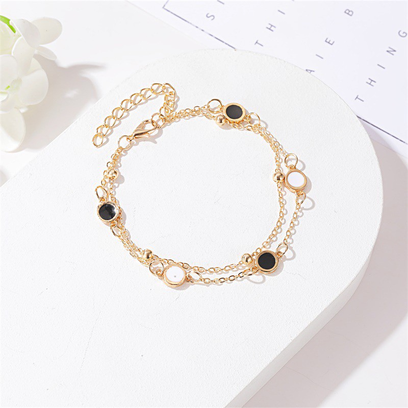 Vòng tay hai lớp đính hạt vỏ sò đen và trắng thời trang Hàn Quốc đơn giản dành cho bạn nữ