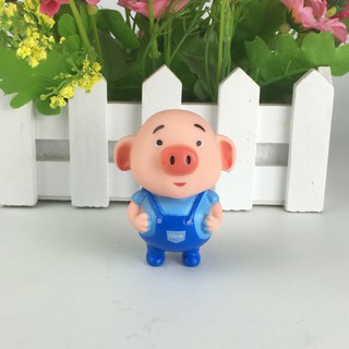 Heo mặc yếm xanh trang trí bánh kem