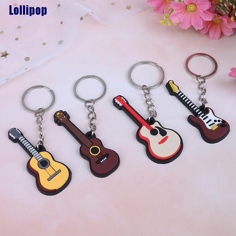 Set 2 Móc Chìa Khóa Bằng Silicon Mềm Hình Đàn Guitar / Ukulele / Điện Oikw