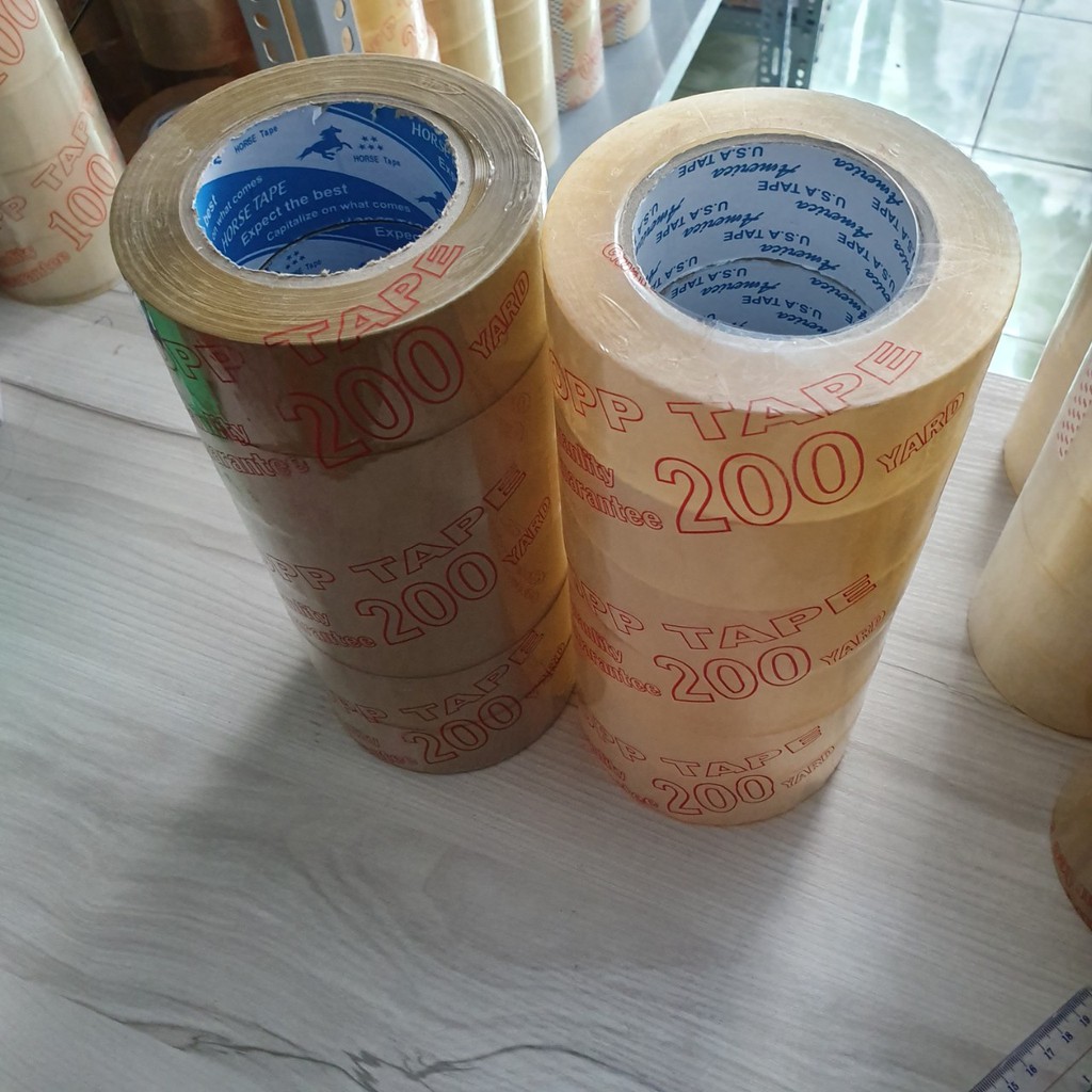 Băng keo siêu dính 200 yard cây 6 cuộn lõi 4li nặng 2kg giá rẻ 2 loại trong đục dán thùng