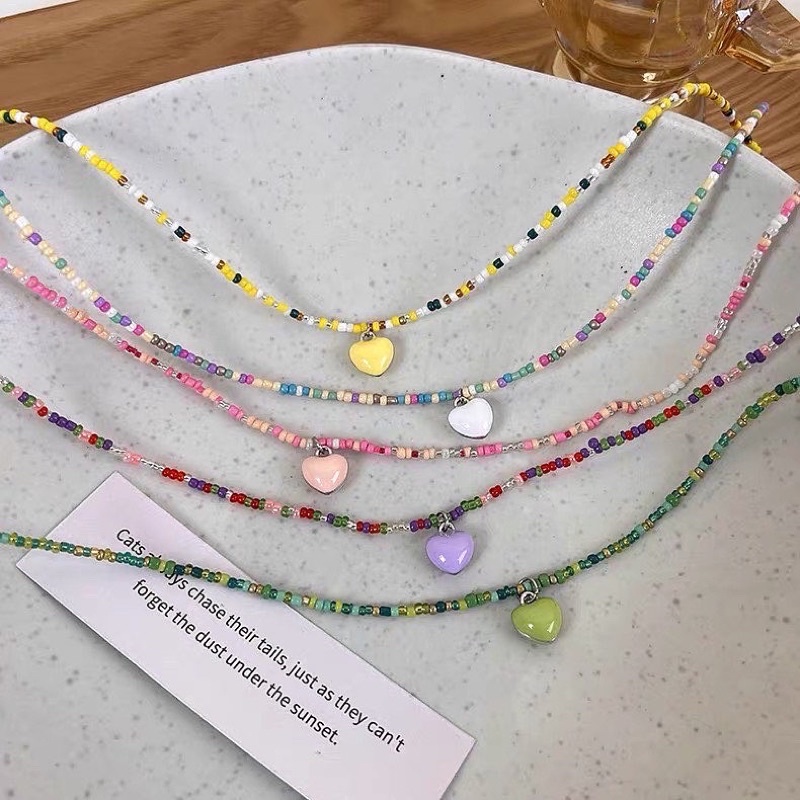 Vòng cổ hạt cườm charm tim
