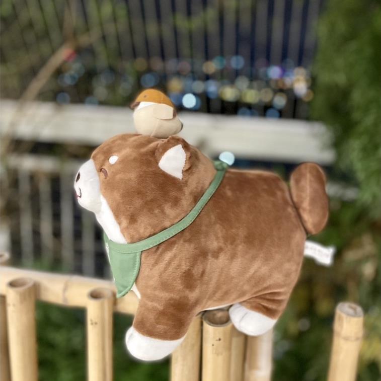 Gấu bông chó Shiba nâu đậm nháy mắt đội chim 25-30cm