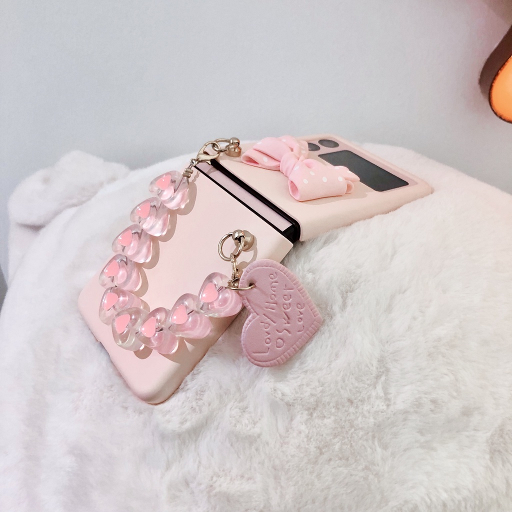 Ốp Samsung Z Flip3 / ZFlip3 / Z Flip4/ ZFlip4 đính nơ có dây xách xinh xắn (2 màu)