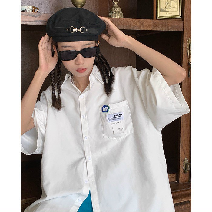 Áo sơ mi nam nữ form rộng  tay lỡ unisex túi ngực in logo AP phong cách cá tính