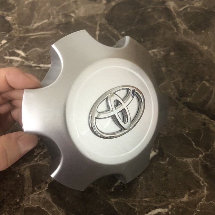 Sản Phẩm Logo chụp mâm, ốp lazang bánh xe ô tô Toyota Land Cruiser Prado TY-116 ( đời 2009, 2010, 2011, 2012, 2013) .