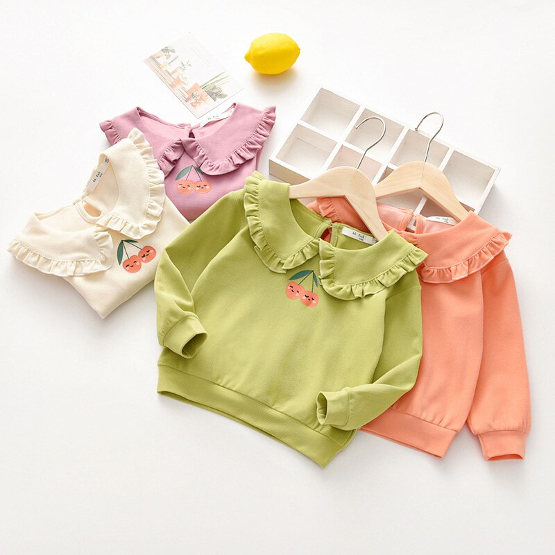 Trẻ em gái 2-6 tuổi Áo phông quần áo Mùa thu dài tay Peter Pan Cổ áo cotton Mùa xuân quần áo hàng đầu