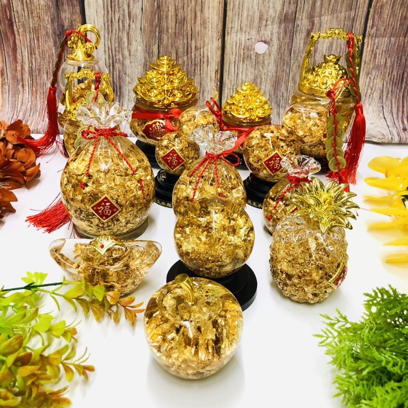 Túi tiền kim bảo, Hũ vàng lá, Hồ lô vàng, Dứa vàng, Vật phẩm ban thần tài...